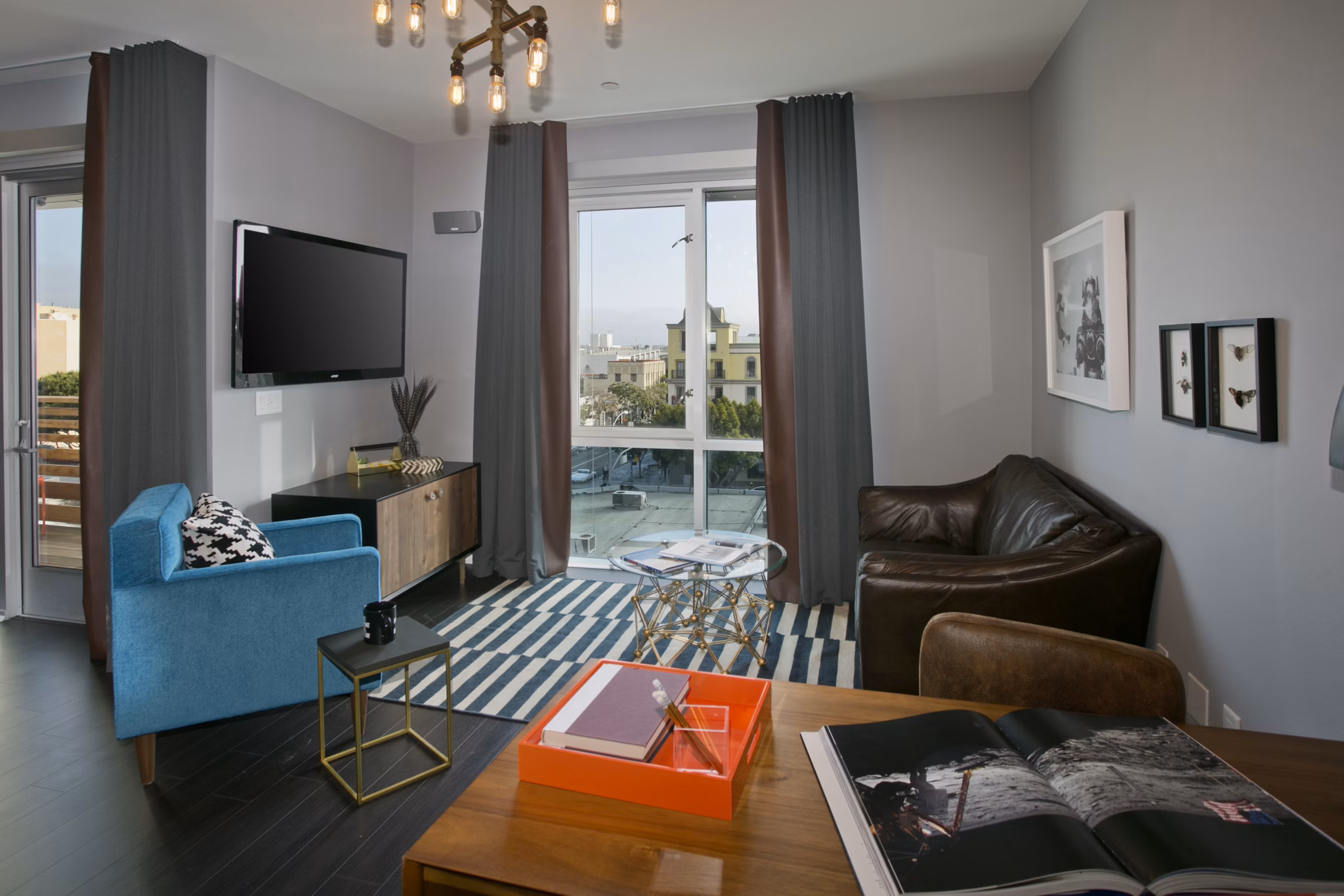 Modern living room with stylish furnishings at Sway Apartments offering luxury touches and comfort for an elevated living experience