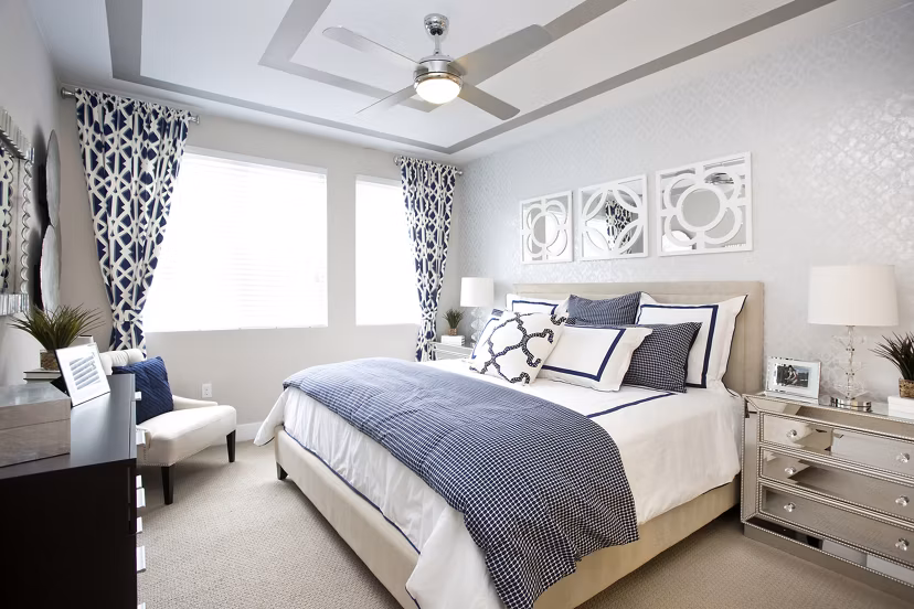 Cozy bedroom with modern decor at Broadstone on 9th Apartments, showcasing luxury living and comfort in a desirable location