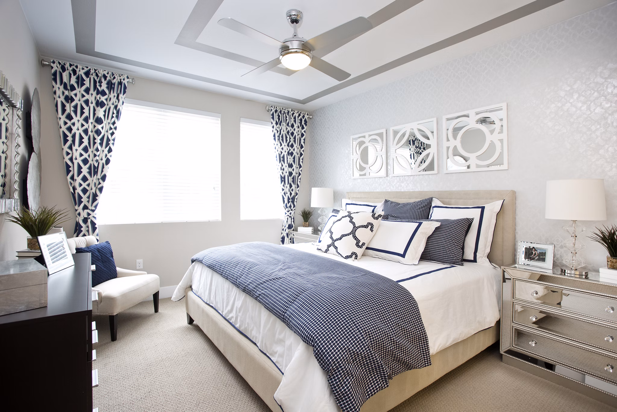 Cozy bedroom with modern decor at Broadstone on 9th Apartments, showcasing luxury living and comfort in a desirable location