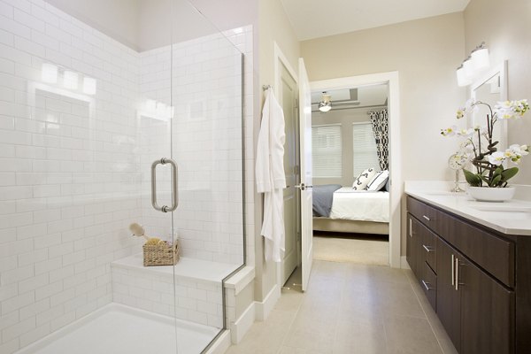 Modern bathroom with sleek fixtures at Broadstone on 9th Apartments, featuring luxury design in the heart of the city