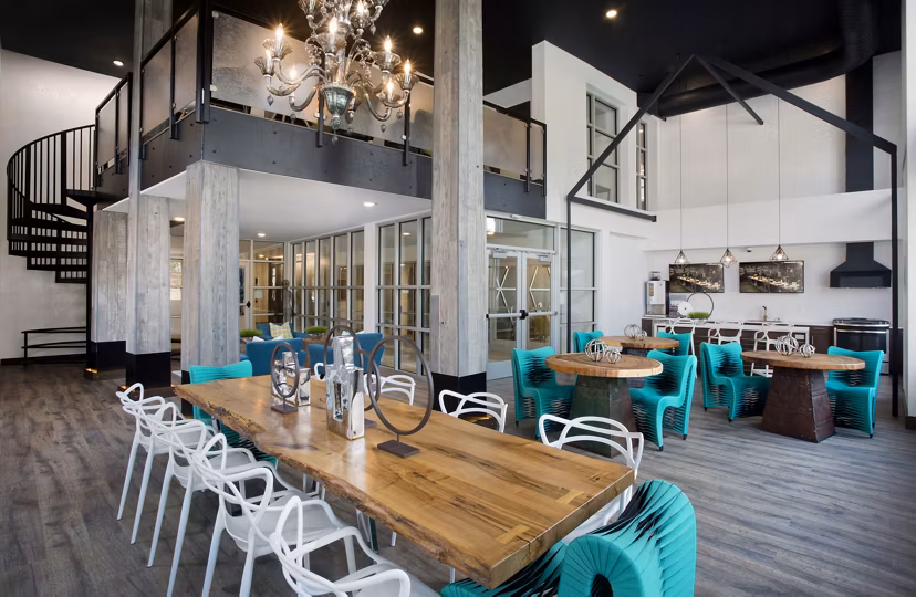 Contemporary clubhouse with stylish seating and gaming area at Broadstone on 9th Apartments