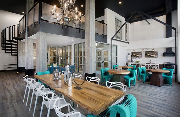 Contemporary clubhouse with stylish seating and gaming area at Broadstone on 9th Apartments