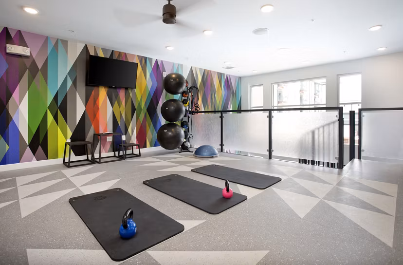 State-of-the-art fitness center at Broadstone on 9th Apartments with modern equipment and ample space for workouts