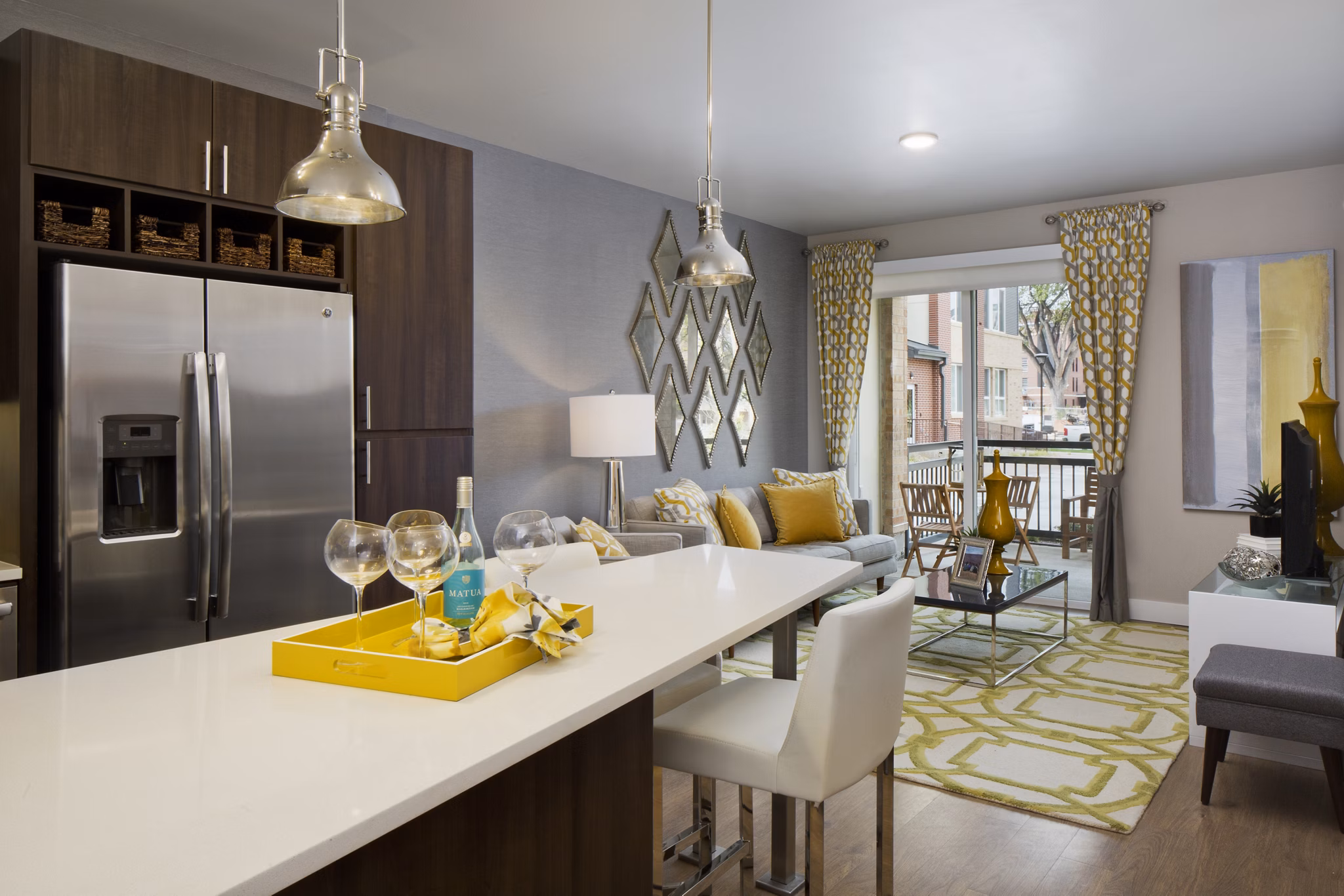 Modern kitchen with stainless steel appliances at Broadstone on 9th Apartments in Los Angeles