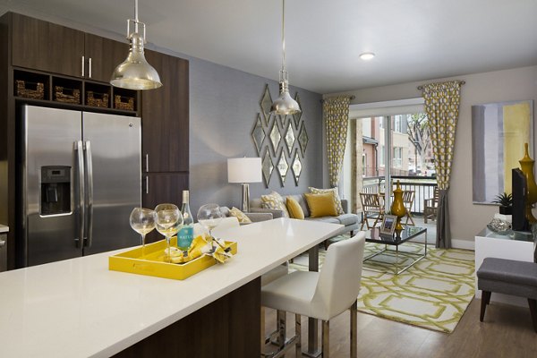 Modern kitchen with stainless steel appliances at Broadstone on 9th Apartments in Los Angeles