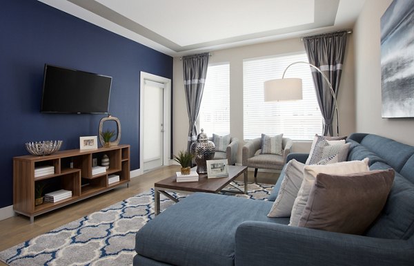 Spacious living room with modern decor at Broadstone on 9th Apartments, ideal for luxury living in the heart of the city