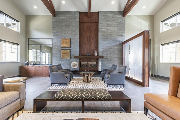 Clubhouse with modern design features at The Artisan Apartments, offering a stylish community space for residents