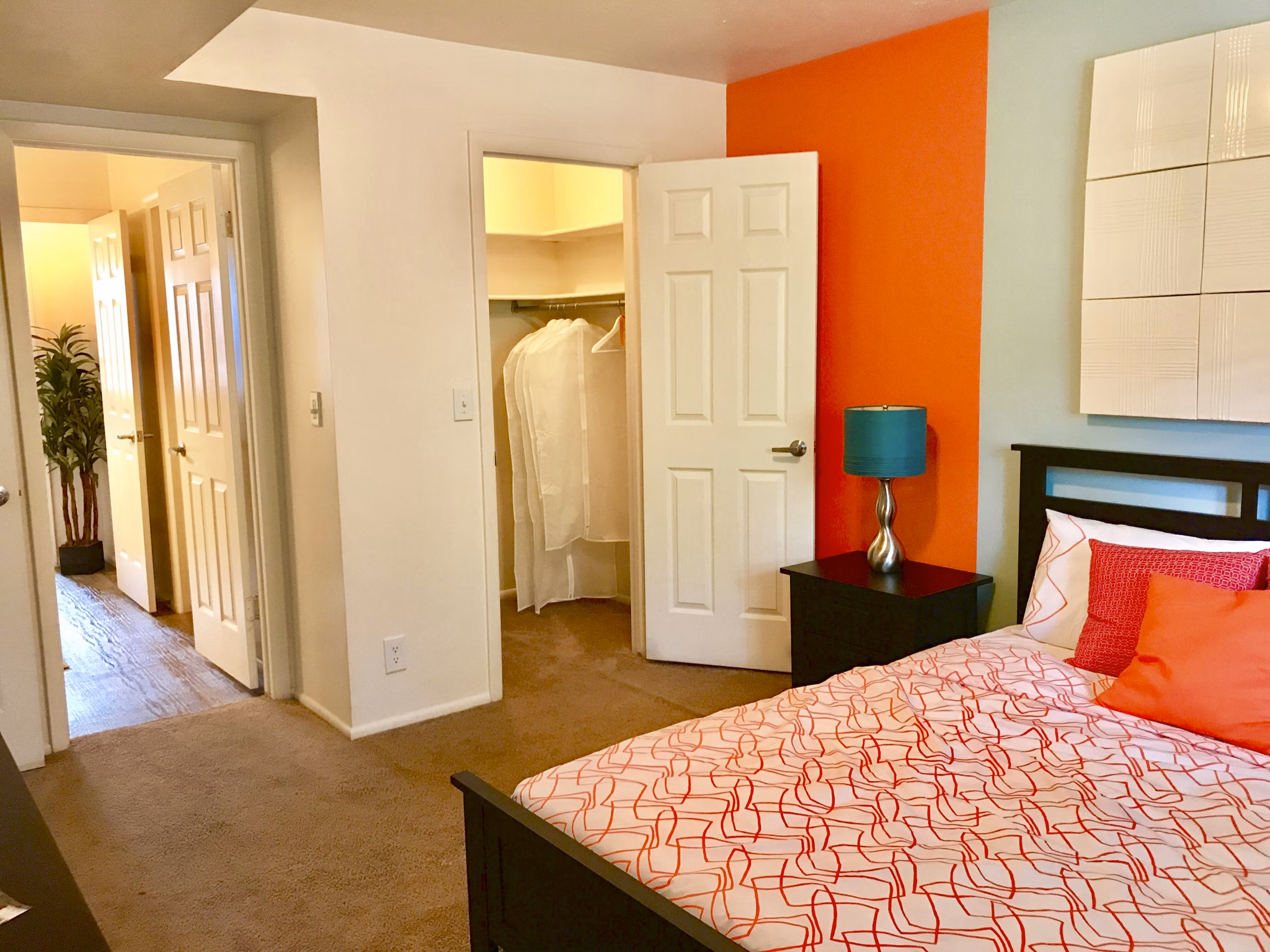 Elegant bedroom with modern furnishings at The Pointe at Northridge luxury apartments
