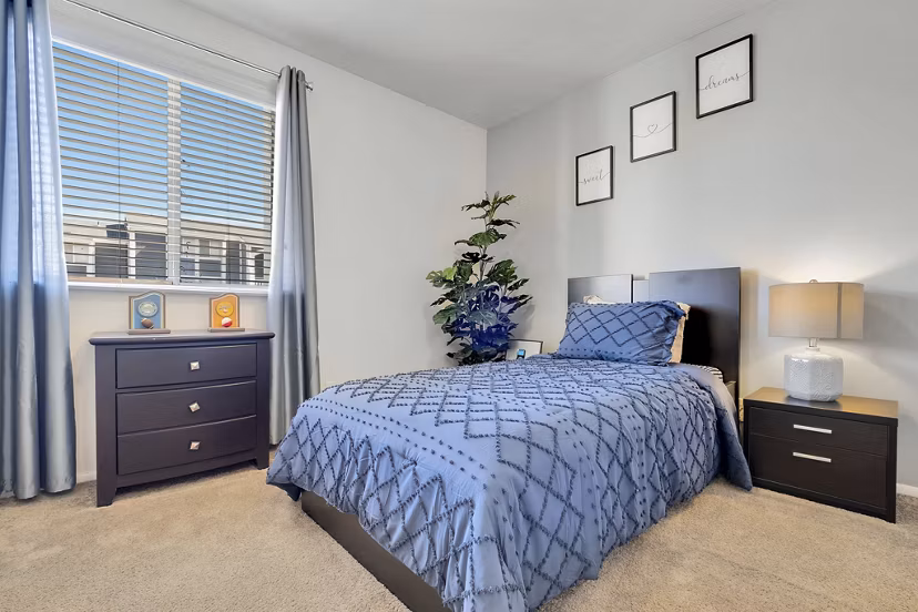 bedroom at The Pointe at Northridge Apartments