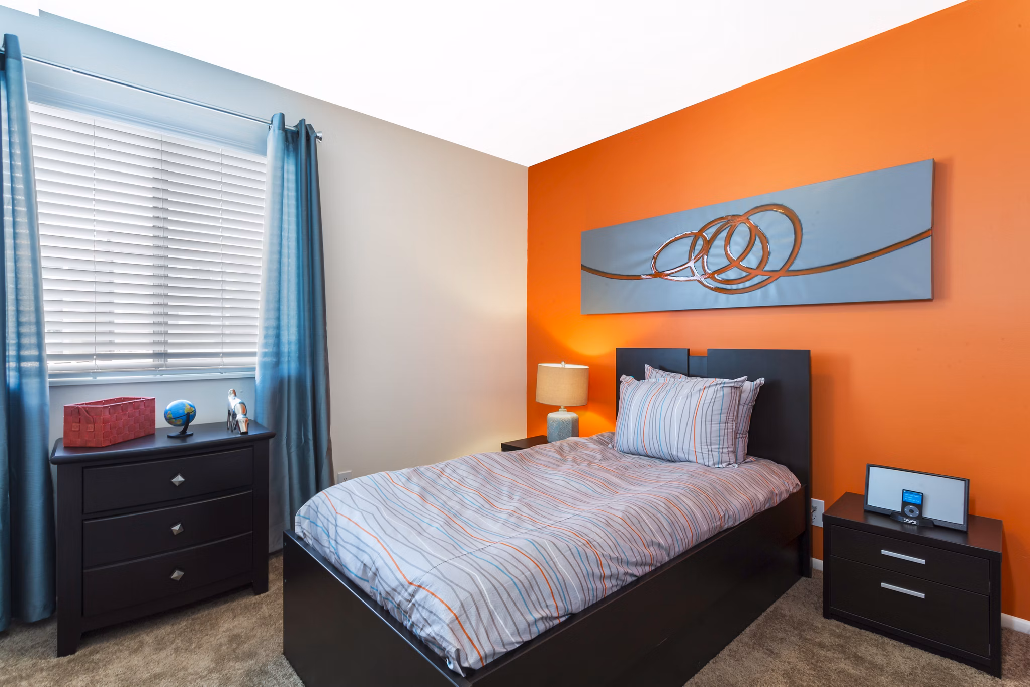 Spacious bedroom with modern furnishings at The Pointe at Northridge luxury apartments