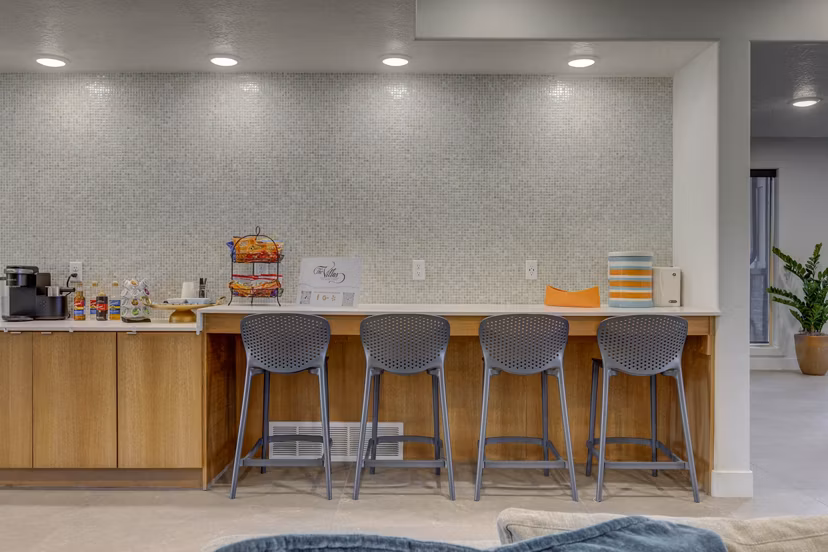 Elegant clubhouse with modern amenities at Villas on Main Apartments for social gatherings and events