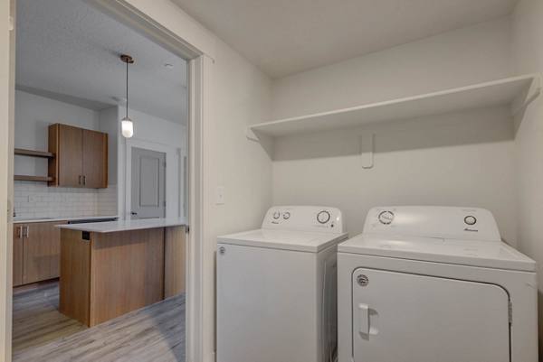 laundry room at Villas on Main Apartments 