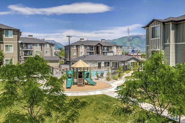 Playground featuring modern play equipment at the Villas on Main luxury apartments in a family-friendly setting