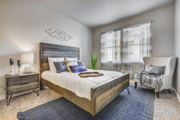 bedroom at Pinnacle Highbury Apartments