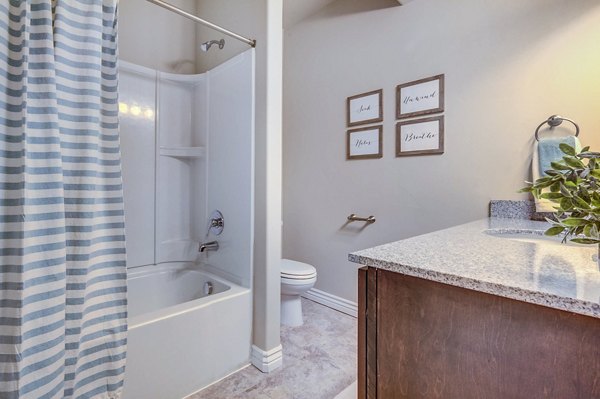 bathroom at Pinnacle Highbury Apartments