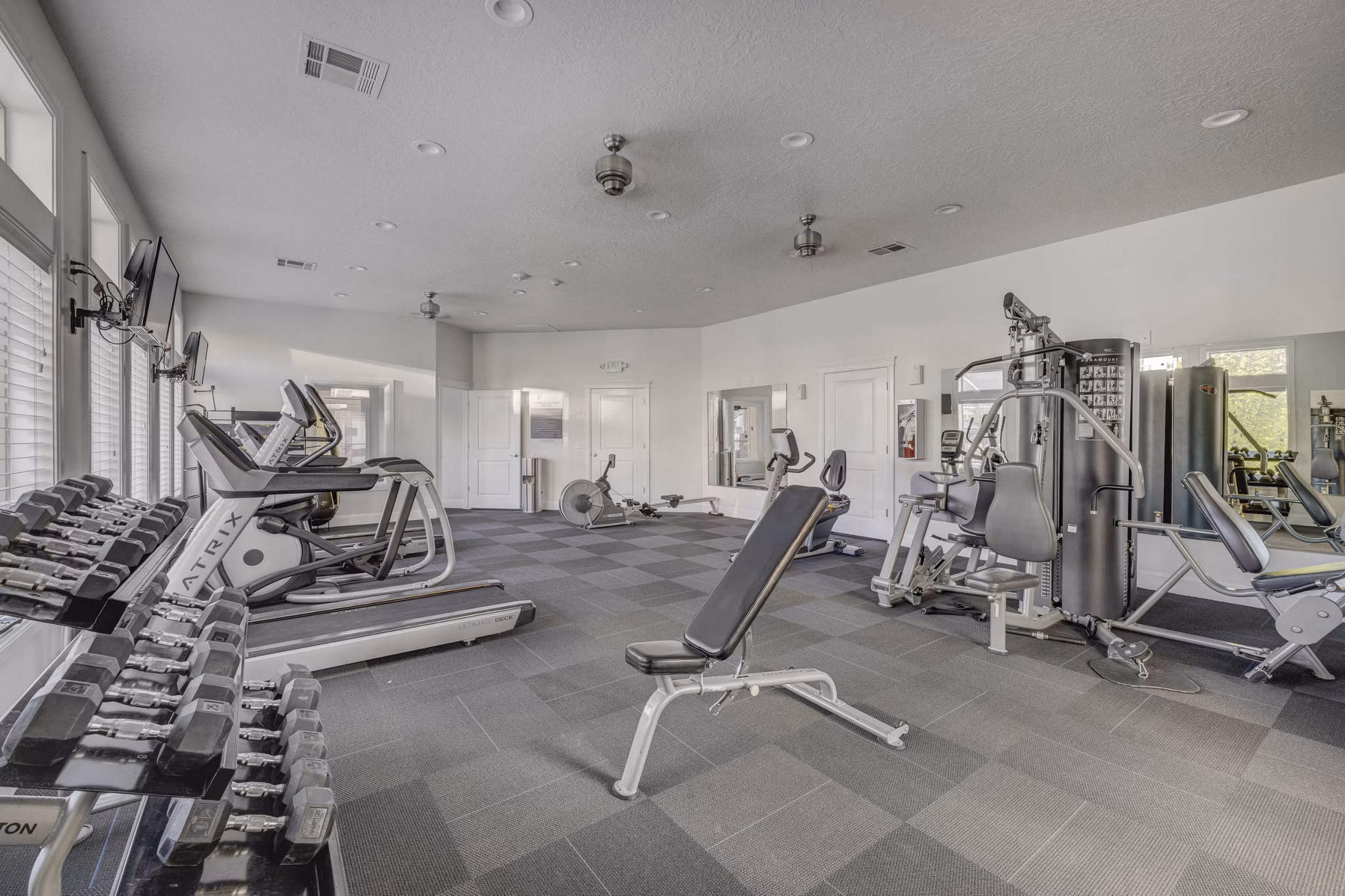 fitness center at Pinnacle Highbury Apartments 