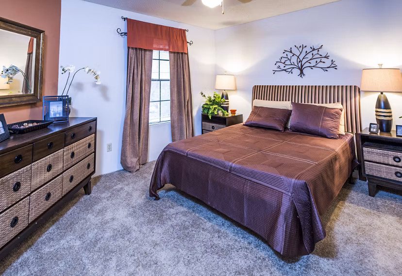 Cozy bedroom featuring elegant decor at Fountainhead Apartments: Luxury living by Greystar
