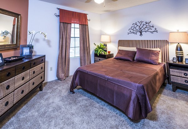 Cozy bedroom featuring elegant decor at Fountainhead Apartments: Luxury living by Greystar