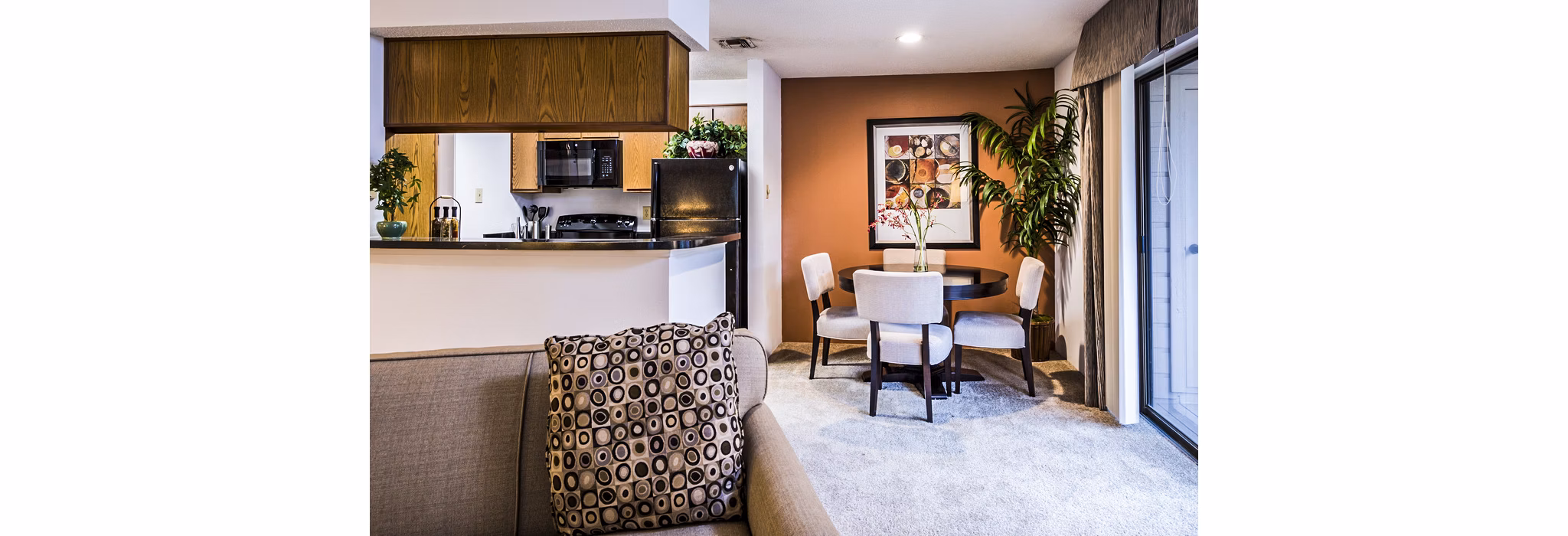 Dining room featuring elegant decor and modern lighting at Fountainhead Apartments