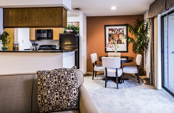 Dining room featuring elegant decor and modern lighting at Fountainhead Apartments
