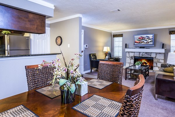 Dining room featuring modern decor and elegant lighting at Fountainhead Apartments