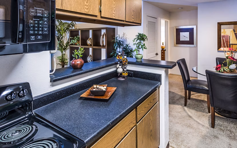 Modern kitchen with stainless steel appliances at Fountainhead Apartments