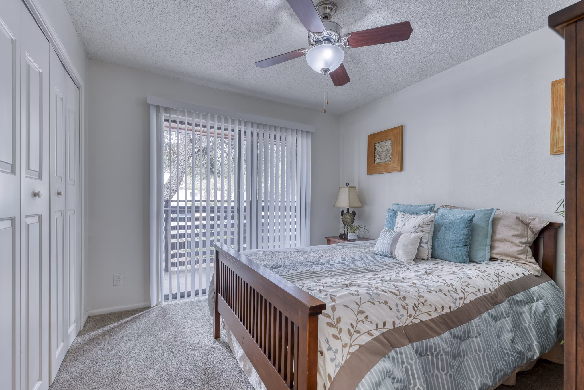Modern bedroom featuring sleek furnishings and ample natural light at Landera Apartments