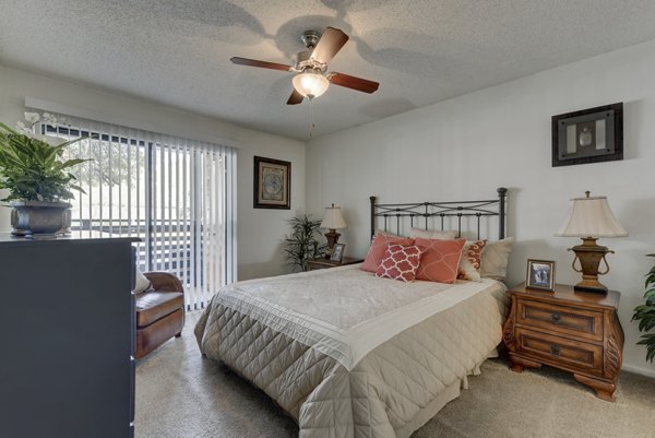 Bedchamber with cozy settings and elegant furnishings in Landera Apartments, a Greystar-managed property known for luxurious living spaces