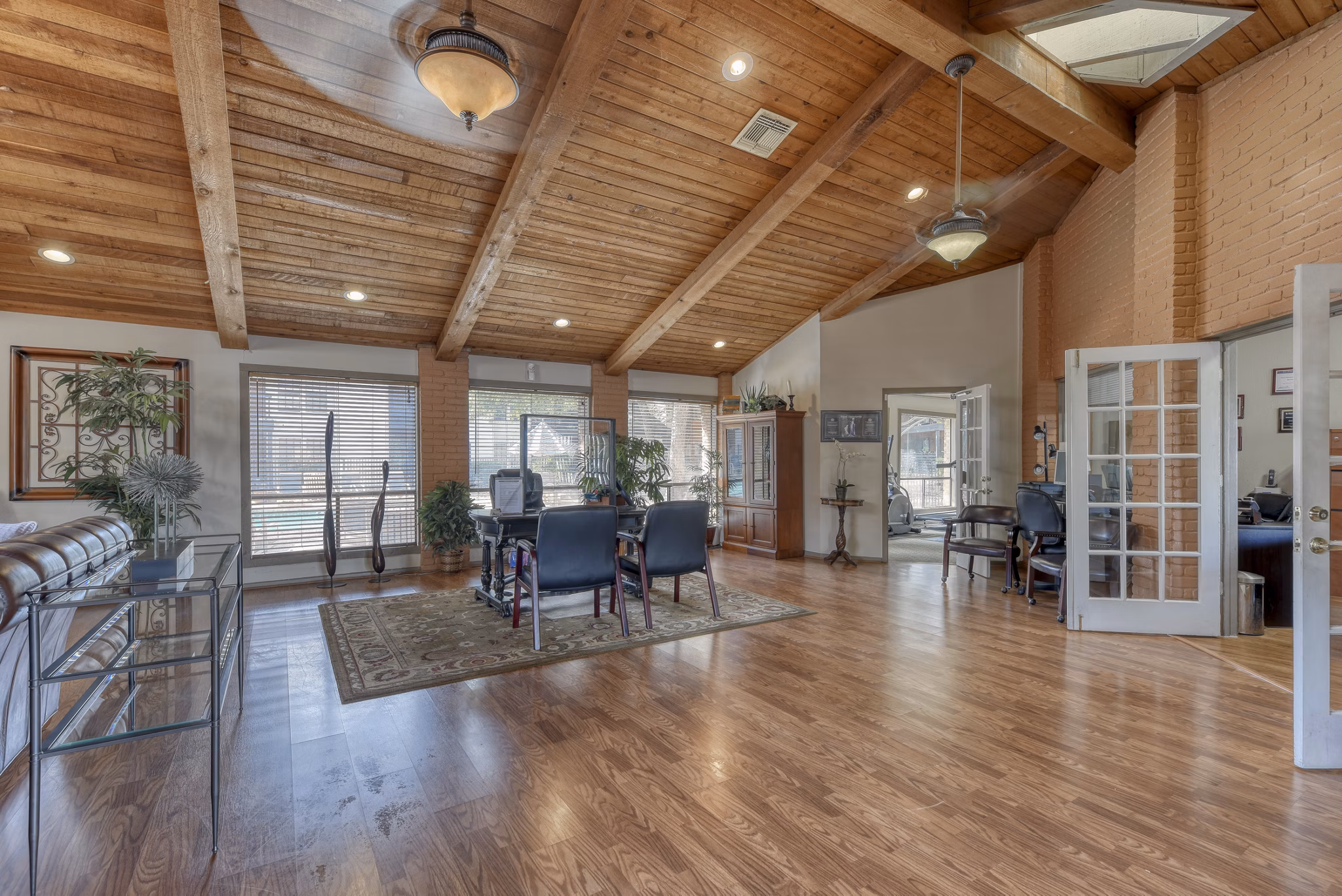 Modern clubhouse with expansive seating and entertainment options at Landera Apartments
