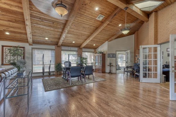 Modern clubhouse with expansive seating and entertainment options at Landera Apartments