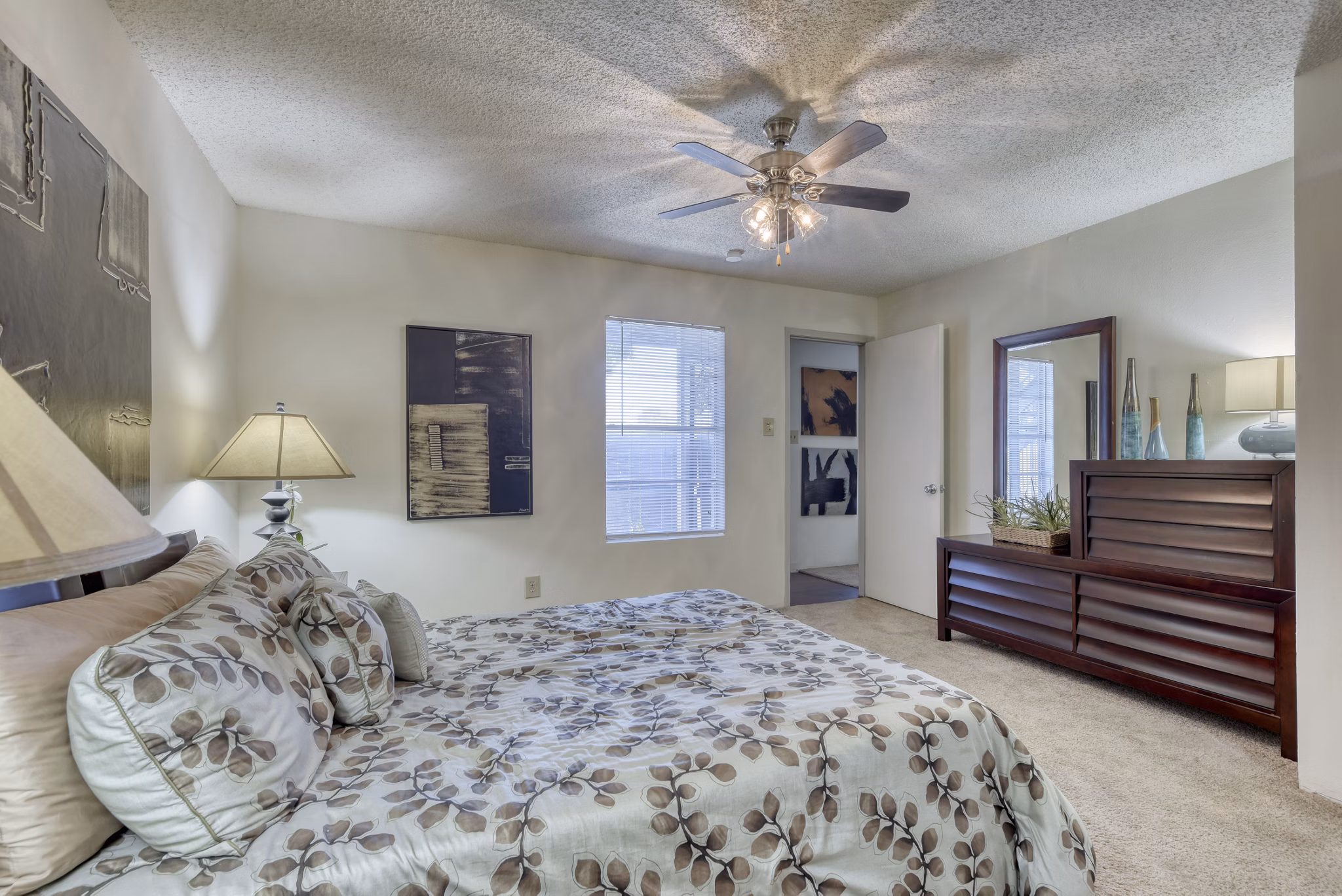 Comfortable bedroom with modern furnishings at Broadstone Medical Apartments in San Antonio