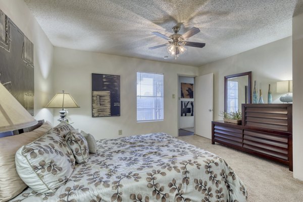 Comfortable bedroom with modern furnishings at Broadstone Medical Apartments in San Antonio