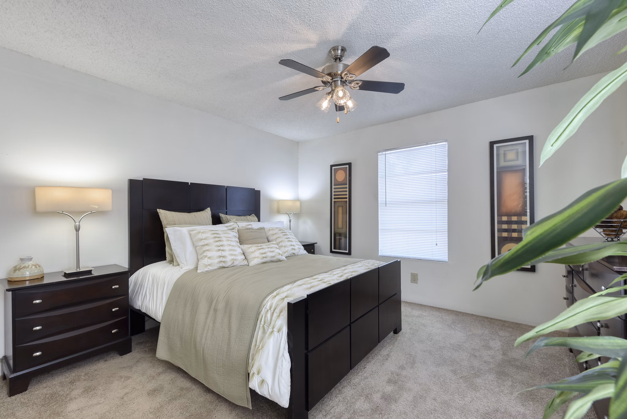 Cozy bedroom with modern furnishings at Broadstone Medical Apartments, offering luxury living near medical centers