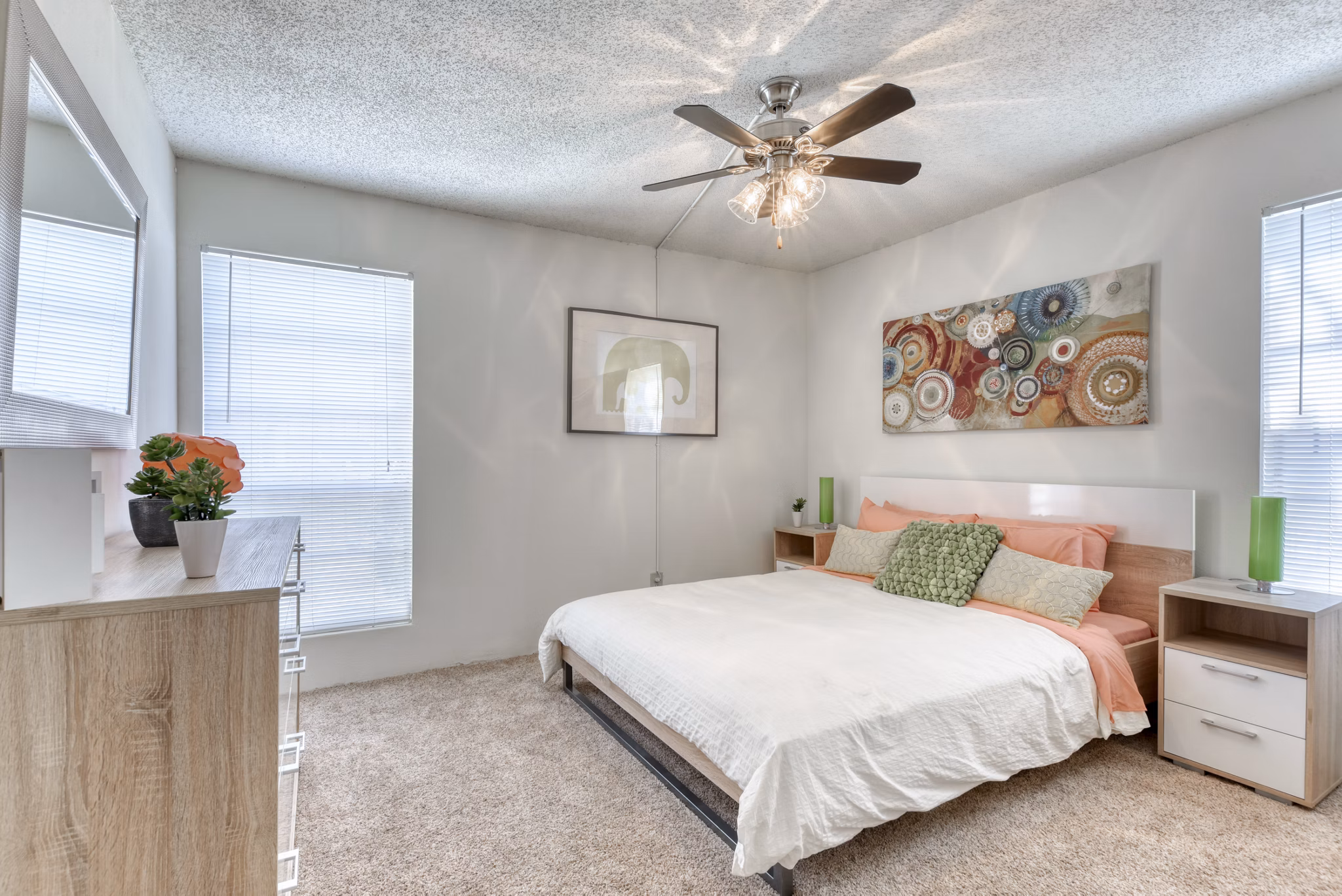 Broadstone Medical Apartments: Stylish bedroom with modern decor and natural light, perfect for comfortable living near medical district
