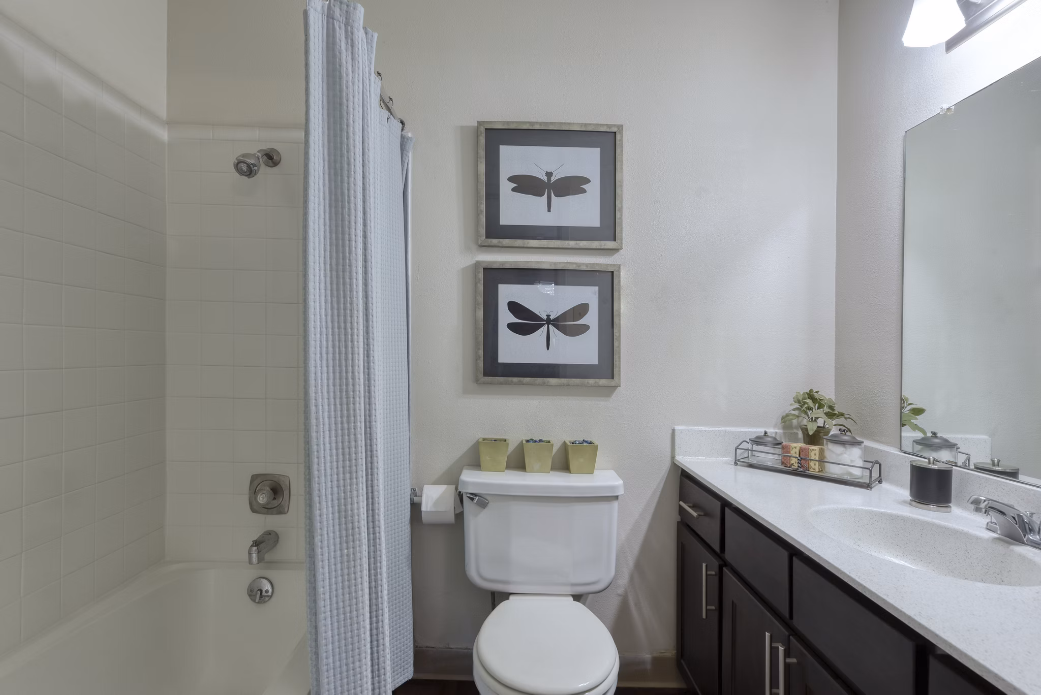 Bathroom with sleek fixtures and modern vanity in Broadstone Medical Apartments