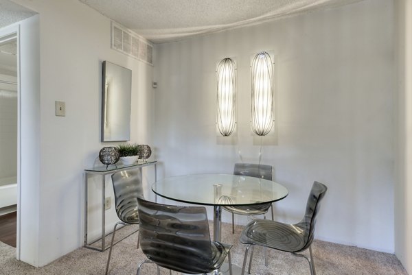 Dining area featuring modern decor and seating at Broadstone Medical Apartments