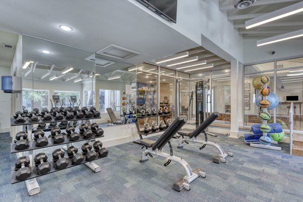 State-of-the-art fitness center featuring modern equipment at Broadstone Medical Apartments