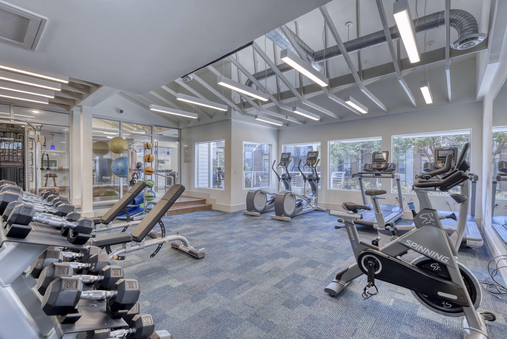 State-of-the-art fitness center at Broadstone Medical Apartments featuring modern workout equipment and spacious exercise areas