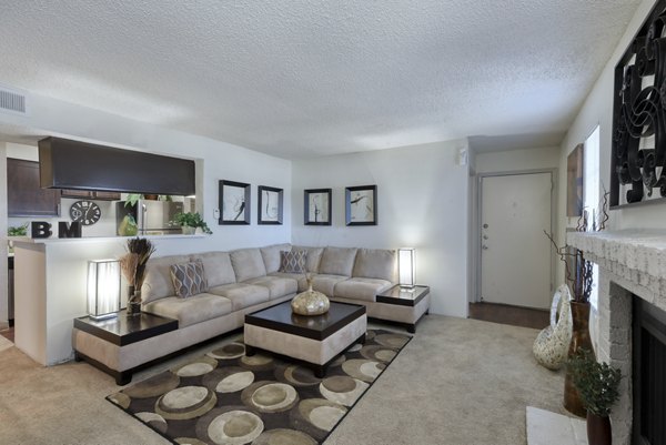 Modern living room with chic furnishings in Broadstone Medical Apartments, perfect for luxury living in a prime location