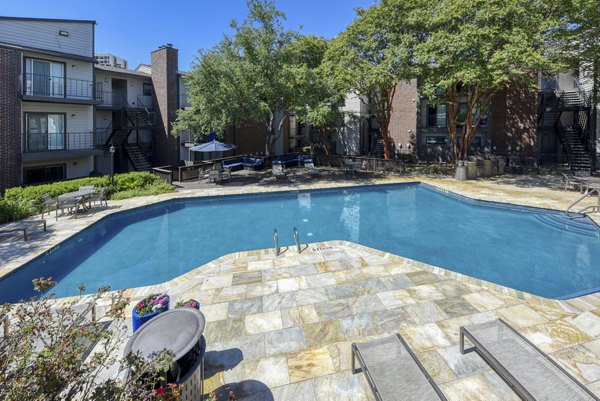 Rooftop swimming pool with cityscape views at Broadstone Medical Apartments
