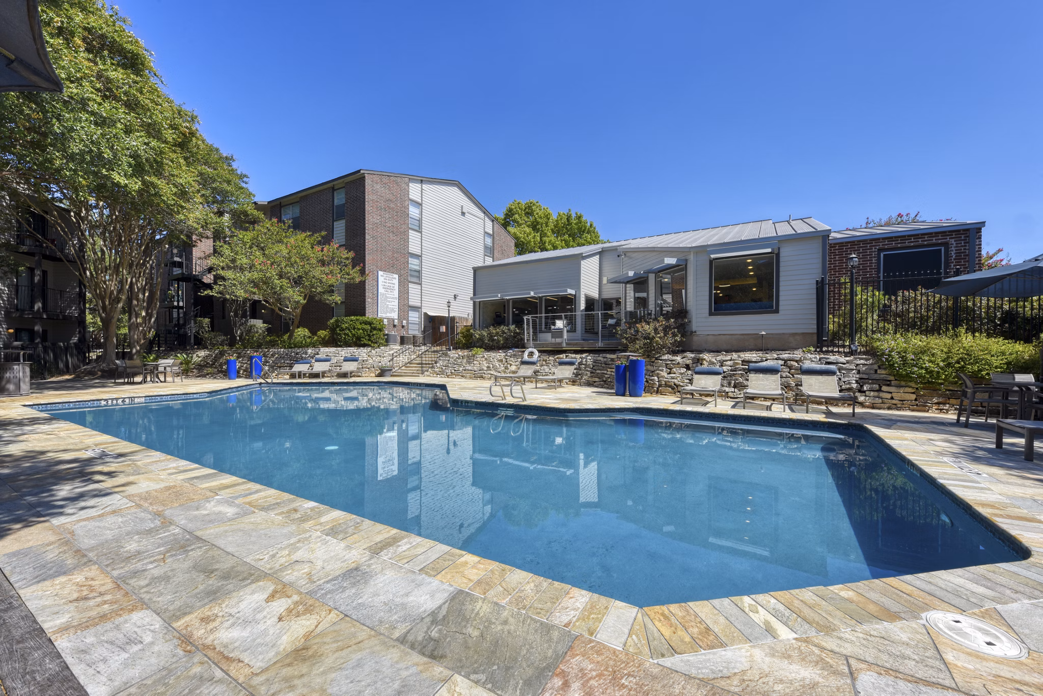 Luxury swimming pool at Broadstone Medical Apartments offering relaxation and leisure for residents in a premium community setting
