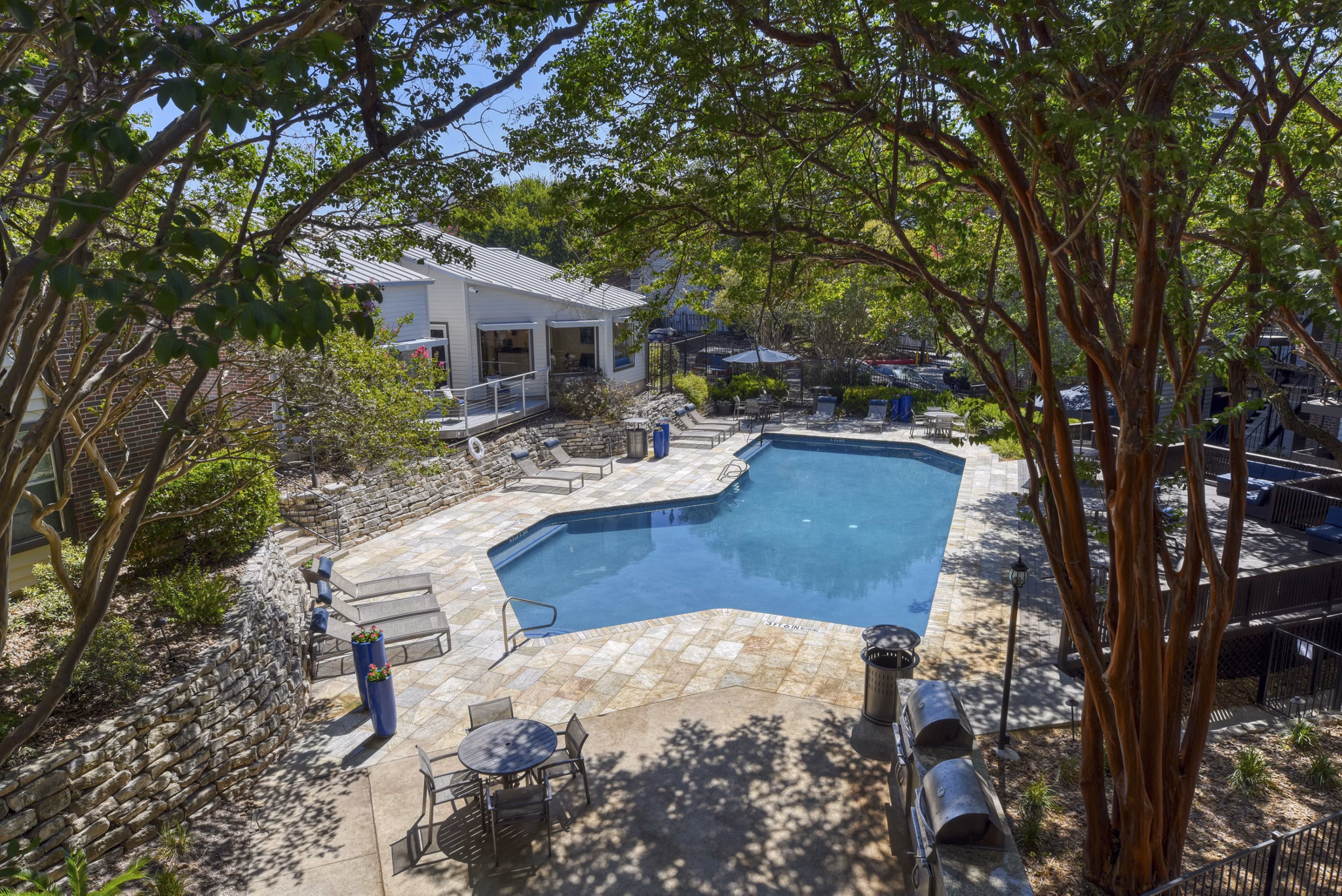 Modern pool area for relaxation at Broadstone Medical Apartments, a Greystar community