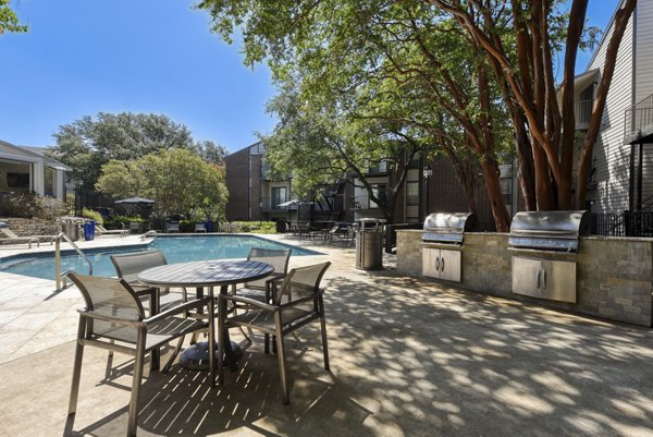 Outdoor grill area with modern BBQ facilities at Broadstone Medical Apartments