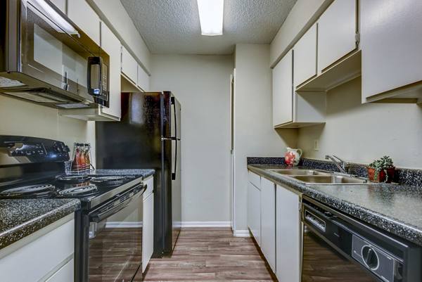 kitchen at Woods of Elm Creek Apartments