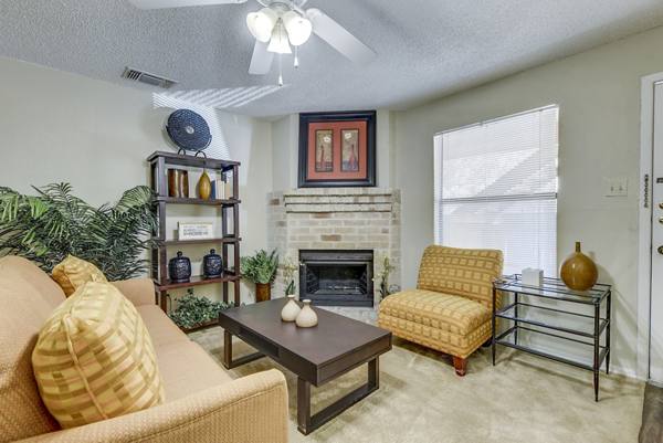 living room at Woods of Elm Creek Apartments