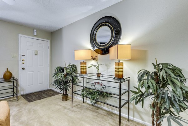 living room at Woods of Elm Creek Apartments