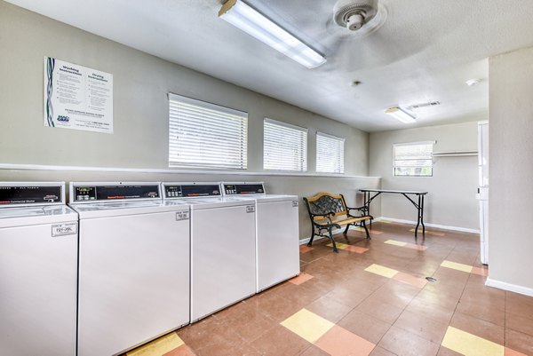 laundry facility at Woods of Elm Creek Apartments