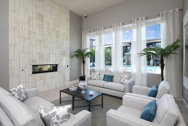Clubhouse with modern design and cozy seating areas at Fiori Estates Apartments