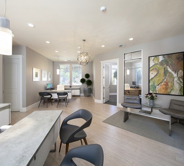 Clubhouse with modern furnishings at Fiori Estates Apartments, a luxury apartment community featuring high-end amenities and designs