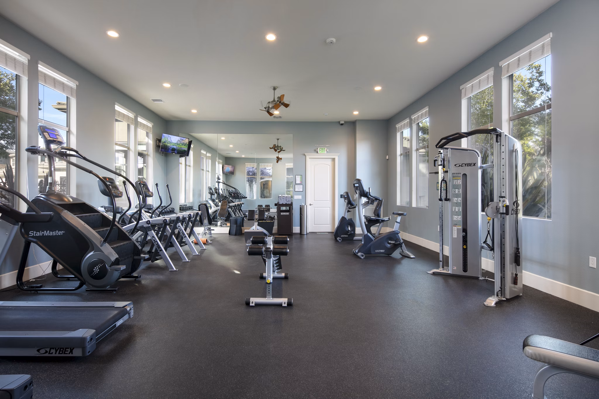 Modern fitness center with state-of-the-art equipment at Fiori Estates Apartments
